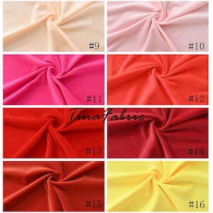 May include: A collection of fabric swatches in various shades of red, pink, yellow, and orange. The swatches are arranged in a grid pattern with numbers 9 through 16 labeled below each swatch.