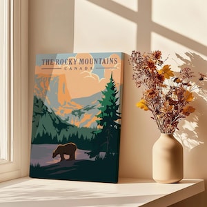 Rocky Mountains Canada wall art print with bear and pine trees by sunlit window, vase of dried flowers