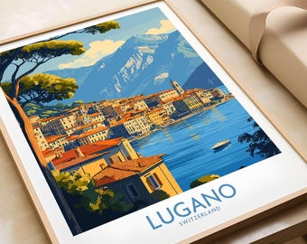 May include: A vintage travel poster featuring a colorful illustration of Lugano, Switzerland. The poster depicts a picturesque town nestled along a lake with mountains in the background. The text "Lugano, Switzerland" is displayed in blue lettering at the bottom of the poster.