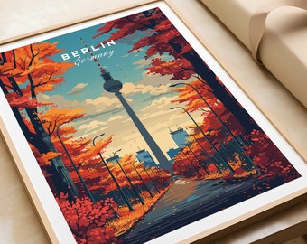 May include: A colourful illustration of the Berlin skyline featuring the iconic TV Tower in the centre. The tower is surrounded by trees with red, orange and yellow leaves. The text "BERLIN Germany" is at the top of the image.