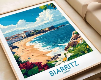 May include: A colorful illustration of Biarritz, France, featuring a beach, ocean, and city skyline. The image is framed in a light wood frame.