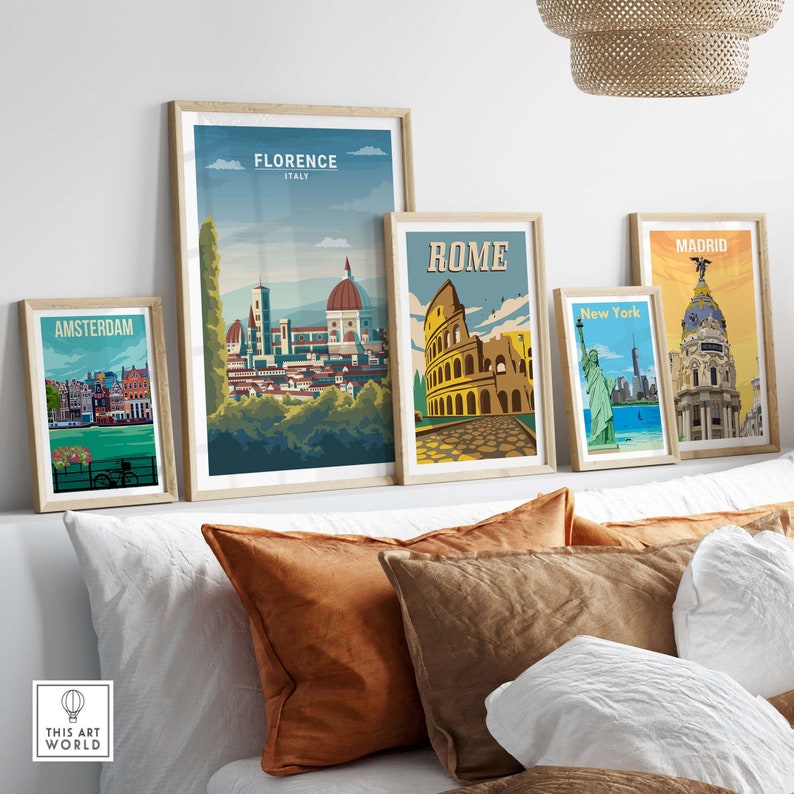 May include: Five framed travel posters with vintage-style illustrations of famous landmarks. The posters feature Amsterdam, Florence, Rome, New York City, and Madrid.