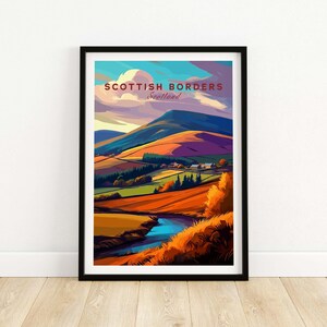 May include: A colourful illustration of a landscape in the Scottish Borders, Scotland. The image features rolling hills, a winding river, and a small village in the distance. The sky is a vibrant blue with fluffy white clouds. The text "SCOTTISH BORDERS Scotland" is printed in red at the top of the image.