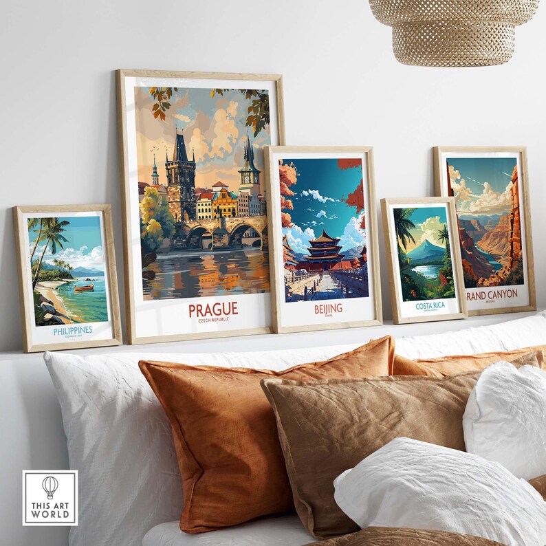Prague Travel Poster displayed among other travel posters in a stylish home setting with decorative cushions.