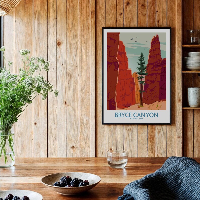 Bryce Canyon National Park art print in black frame on wood wall in cozy kitchen setting