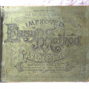 May include: A vintage green book cover with the title "Improved Easy Method for the Parlor Organ" in black lettering. The book was published by Montgomery Ward & Co. in Chicago, Illinois.
