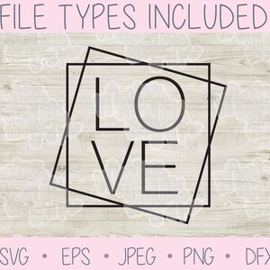 May include: A black and white graphic design of the word "LOVE" in a geometric frame. The design is on a light wood background.