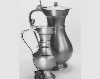 Set of 2 vintage pewter jugs (Belgium). Acorn.