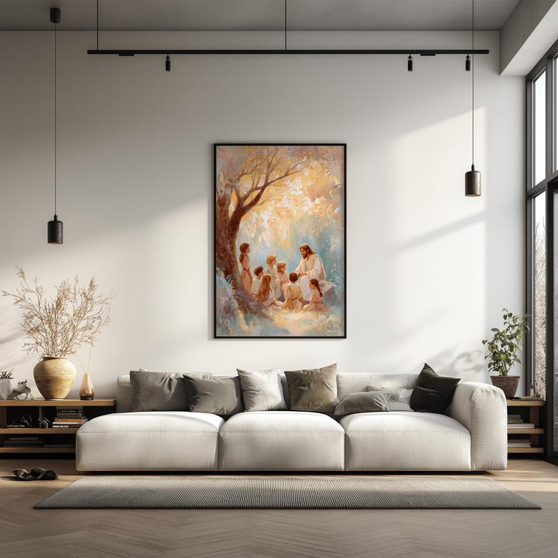 May include: A framed painting depicts a religious scene with figures under a tree. The artwork is displayed above a white sofa with several throw pillows. The room features a modern design with neutral colors, track lighting, and a large window.