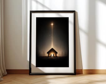 May include: Framed art print depicting a silhouette of a stable with figures inside, illuminated by a bright star above. The artwork is set against a dark background, creating a dramatic contrast. The frame is black, and the print is displayed on a wooden floor.