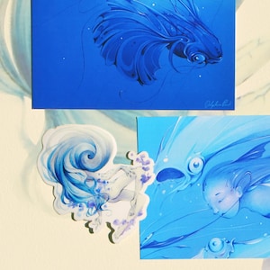 Trio Bleu (deux cartes postales et un autocollant)