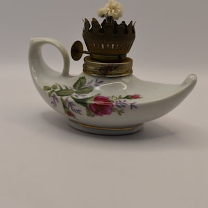 Vintage small porcelain genie oil with roses