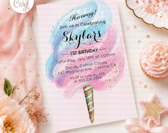 May include: A rectangular birthday invitation card featuring a watercolor cotton candy graphic in blue and pink with gold glitter accents. The text reads: Hooray! Join us in Celebrating Skylars 1ST BIRTHDAY, Saturday, July 18th at 1:00pm, Dandy Cotton Candy, 347 Magnolia Ave., Corona, CA, RSVP to Julia by 7/13 at 905.326.3998.