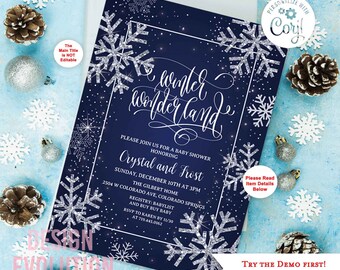 以下が含まれることがあります： 雪の結晶と「ウィンターワンダーランド」と「クリスタルとフロスト」の文字が書かれた、青と銀のベビーシャワーの招待状です。