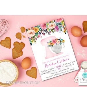 May include: A pink and white kitchen tea invitation with floral designs and a watercolor illustration of a stand mixer. The invitation is for Rosalee Collins and includes the date, time, and location of the event. It also includes a request for regrets to be sent by a certain date.