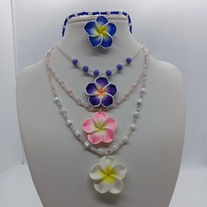 Gorgeous hibiscus plumeria flower beaded necklace