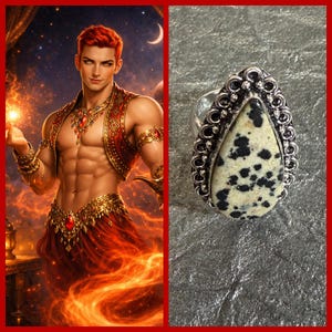 May include: A silver ring with a teardrop-shaped stone featuring a cream-colored base and black spots. The ring has an ornate, textured border. The image also includes a fantasy illustration of a muscular figure with red hair and a red and gold outfit.