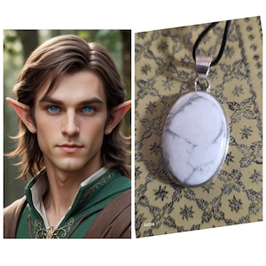 May include: A pendant necklace featuring a large, oval-shaped white stone with gray veining, set in a silver-colored metal frame. The pendant hangs from a black cord. The image also includes a portrait of a person with elf ears.