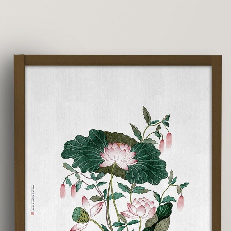 May include: A framed print of a traditional Asian painting featuring pink lotus flowers and green leaves. The text "KOREAN CALLIGRAPHY" is printed in the bottom left corner.