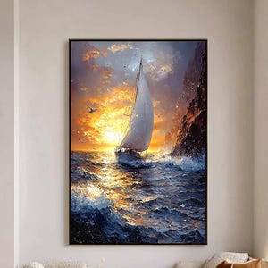 May include: An oil painting in a black frame shows a sailboat on a stormy sea at sunset. The artwork features a white sailboat with a full sail, set against a backdrop of orange, yellow, and blue hues, with a rocky cliff on the right.