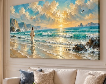 May include: A large rectangular canvas wall art print depicting a coastal landscape at sunrise. The scene features a figure in a white robe walking along the shoreline, turquoise ocean waves, dark rocky cliffs, and a bright golden sky with clouds.