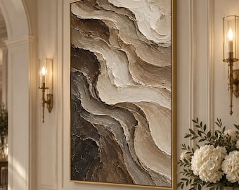 May include: A vertical rectangular wall art piece featuring thick, textured impasto paint in shades of dark brown, beige, and cream. The abstract composition displays layered, wavy horizontal ridges that create a sense of depth and movement.
