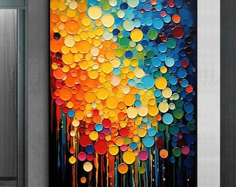 May include: Abstract art canvas print featuring a vibrant composition of colorful circles in shades of orange, yellow, blue, and green. The artwork has a textured appearance with a black background and vertical streaks of color.