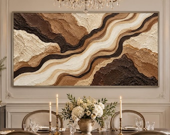 May include: A large rectangular wall art piece featuring a thick, textured impasto painting with abstract, flowing horizontal layers in shades of cream, beige, tan, and dark brown, creating a topographic, layered landscape effect.