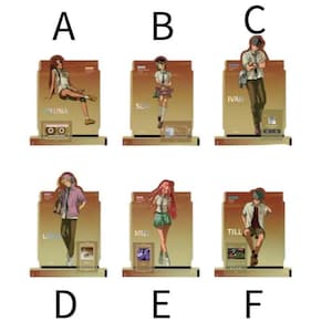 May include: Six acrylic character standees labeled A through F, featuring anime-style figures named Yuna, Sua, Ivan, Luke, Mizi, and Till. Each standee includes a rectangular base, a character cutout, and a small graphic element like a cassette tape.