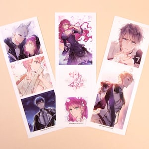 May include: A set of six illustrated bookmarks featuring characters from a manga or anime. The bookmarks are printed on white cardstock and feature a variety of characters, including a woman with pink hair, a man with blonde hair, and a man with brown hair. The bookmarks are all rectangular in shape and have rounded corners. The text on the bookmarks is in Korean.
