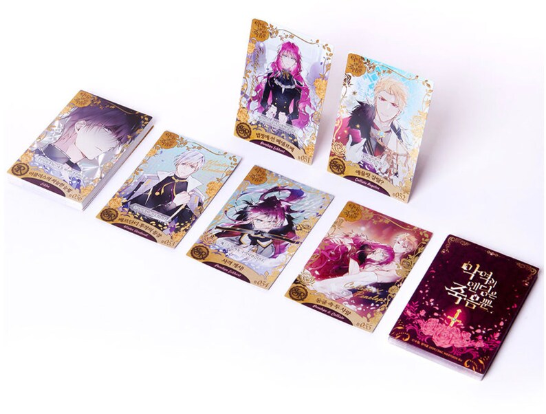 May include: A set of seven collectible cards featuring anime characters from the Korean webtoon "The Remarried Empress". The cards are gold and purple with intricate designs and feature the text "The Remarried Empress".
