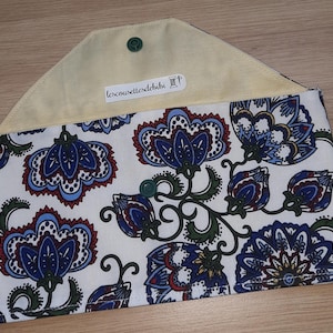 Flat multi-purpose cotton pouch, which closes with a button, discreet pouch