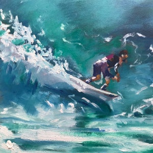 May include: A painting of a person surfing on a wave. The wave is a teal blue color and the person is wearing a purple shirt and black shorts. The person is riding a surfboard and the wave is breaking behind them.