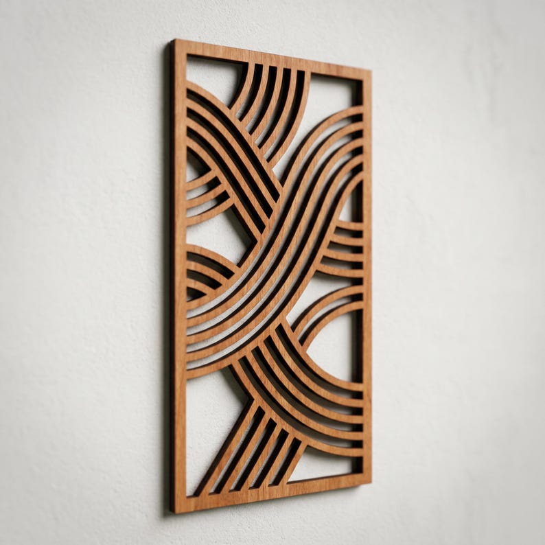 May include: A rectangular wooden wall art piece with a geometric design. The art features a series of curved, parallel lines that intersect and overlap, creating a woven or wave-like pattern. The wood has a warm, natural tone.