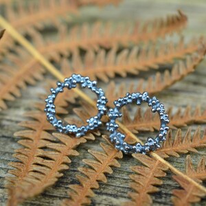 Oxidised small circle stud earrings with granulation clusters