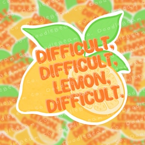 May include: A yellow lemon sticker with green leaves and the text "Difficult, Difficult, Lemon, Difficult." in orange.