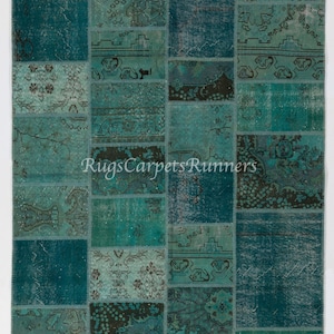 May include: A rectangular patchwork rug in shades of teal and turquoise. The rug is composed of numerous rectangular patches, each with a unique pattern or solid colour. The text "RugsCarpetsRunners" is visible on the rug.