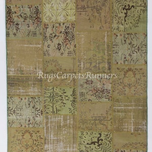 May include: A patchwork rug with a variety of patterns and colors, including green, brown, and beige. The rug is made of recycled materials and has a vintage look.