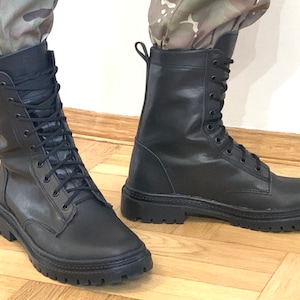 Side view of Ukrainian Scorpion boots — close-up of thick rubber sole and stitched genuine leather upper for maximum durability