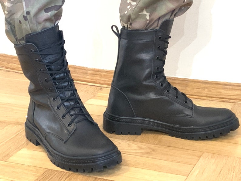 Side view of Ukrainian Scorpion boots — close-up of thick rubber sole and stitched genuine leather upper for maximum durability