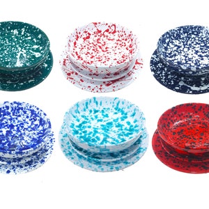 May include: A set of six ceramic bowls and plates with a speckled design. The bowls and plates are in various colors, including green, red, blue, and turquoise, with white speckles. The plates are round and the bowls are round.