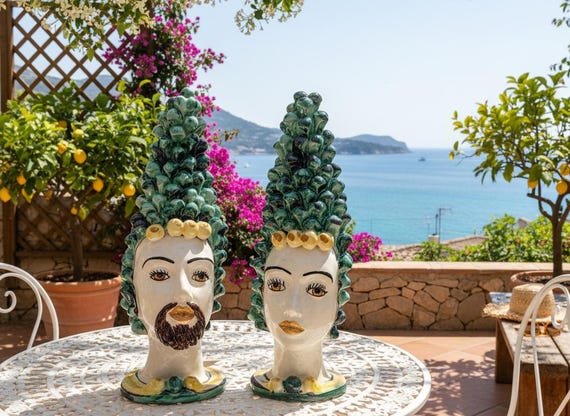 Anthropomorphic heads, pine cones, Caltagirone ceramics, Sicilian ceramics, design, home decoration, unique pieces, craftsmanship, Moorish heads