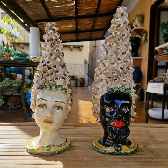 anthropomorphic heads, pine cones, Caltagirone ceramics, Sicilian ceramics, Design, home decoration, unique pieces, craftsmanship, dark brown heads