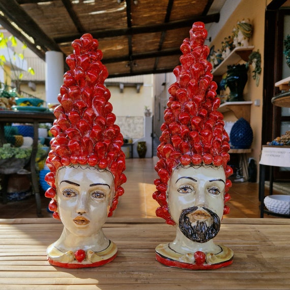 anthropomorphic heads, pine cones, Caltagirone ceramics, Sicilian ceramics, Design, home decoration, unique pieces, craftsmanship, dark brown heads