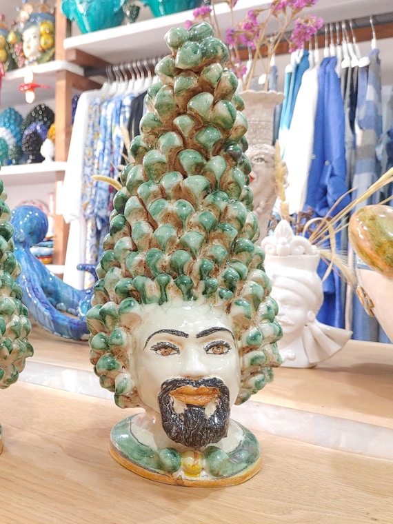 Anthropomorphic heads, pine cones, Caltagirone ceramics, Sicilian ceramics, design, home decoration, unique pieces, craftsmanship, Moorish heads