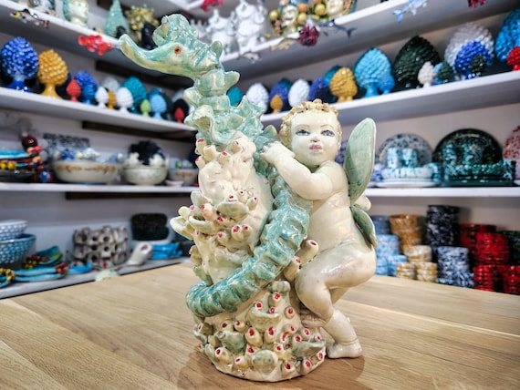 angel among corals in Sicilian ceramic handcrafted, sculpture, fantasy, corals, sea , saint, Angel , putto, angel