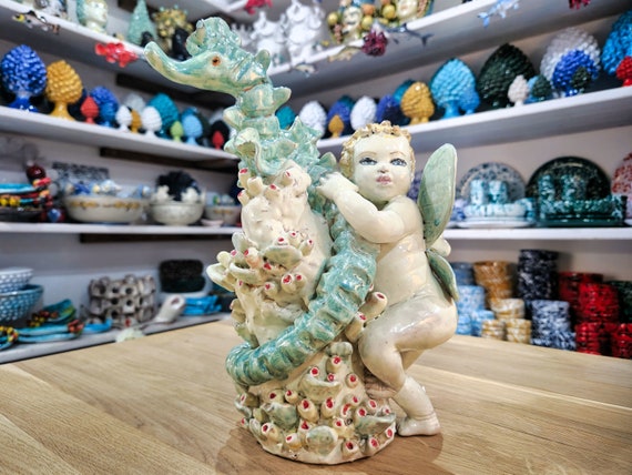 little angel among corals in Sicilian ceramics, handcrafted, sculpture, fantasy, corals, sea, saint, angel, cherub, little angel