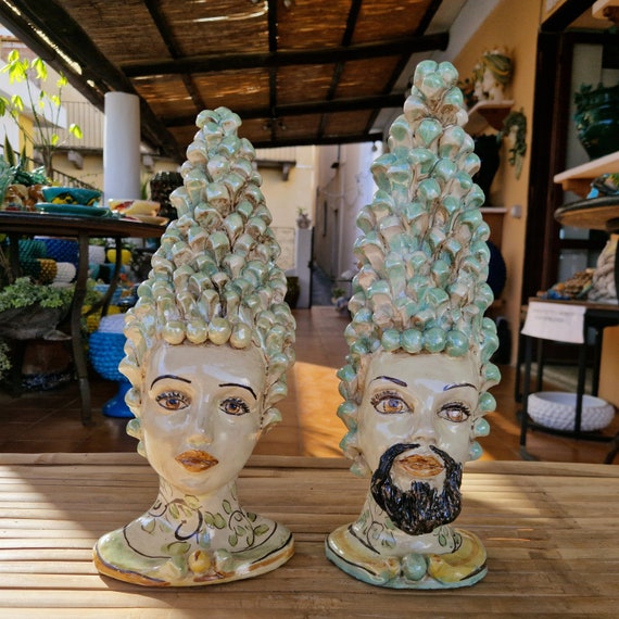 anthropomorphic heads, pine cones, Caltagirone ceramics, Sicilian ceramics, Design, home decoration, unique pieces, craftsmanship, dark brown heads