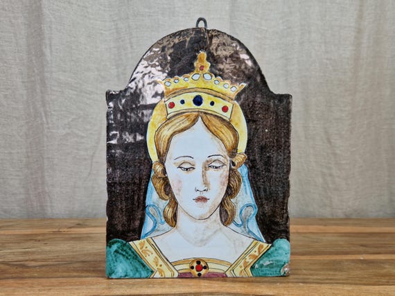 Sicilian tile with a royal representation