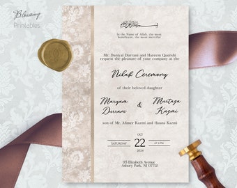 May include: A wedding invitation with a white background and gold accents. The invitation features a floral pattern and the text "Nikah Ceremony" in a cursive font. The date and time of the ceremony are listed as "October 22, 2024 at 4 PM".